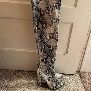 Snake print over the knee boots